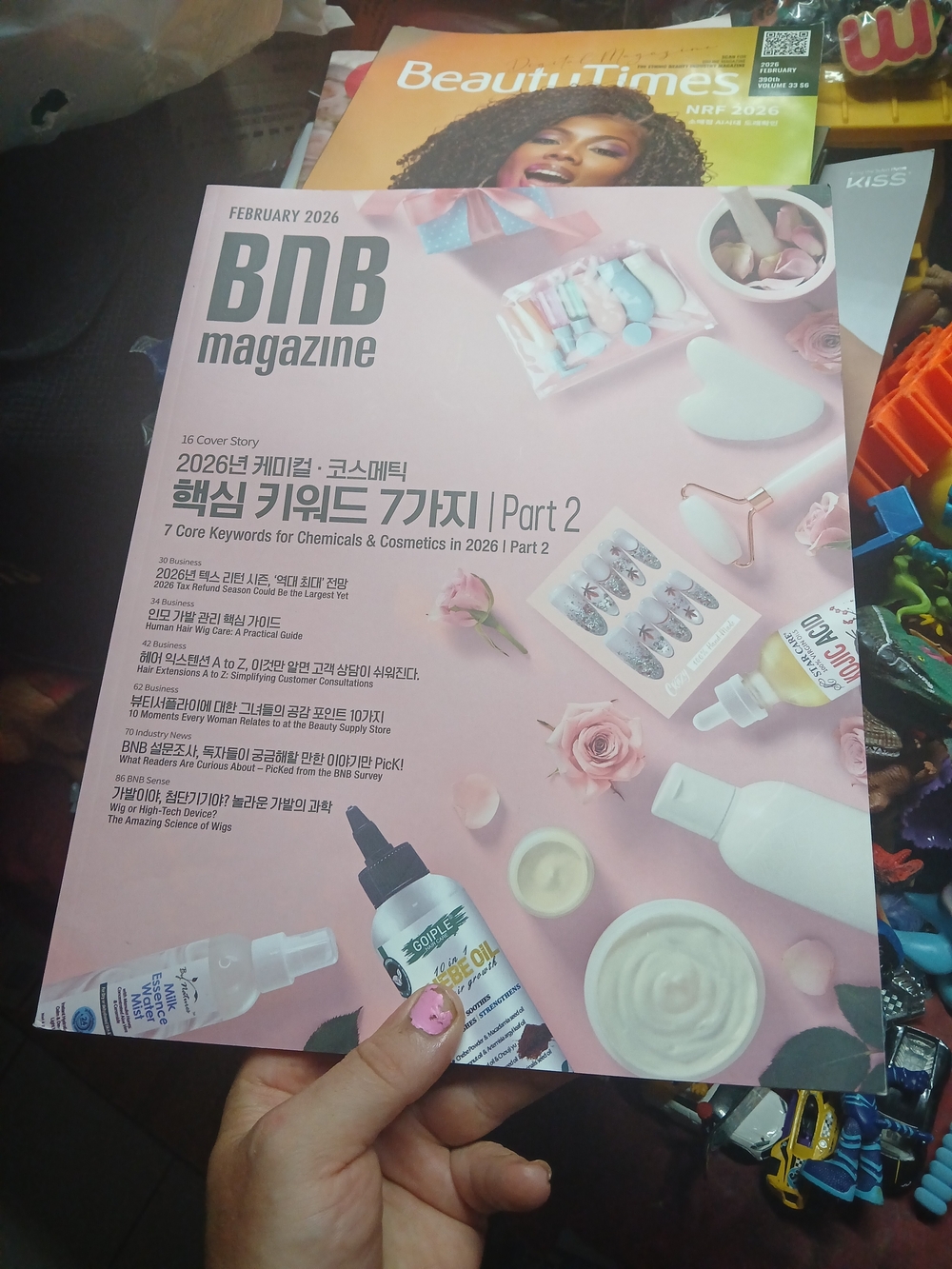 February 2026 issue of BnB magazine, featuring a pink aesthetic with beauty prod